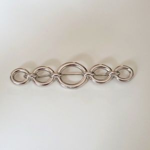 Vintage Yves Saint Laurent silver brooch